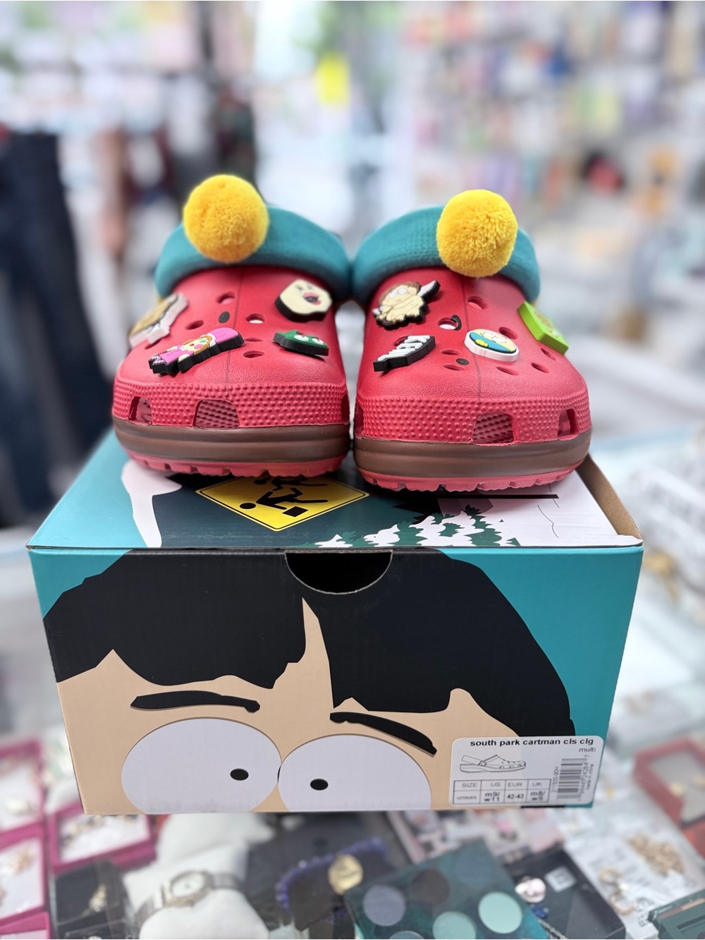 Crocs Red Clog Shoes with Teal Trim and Yellow Pom-Poms